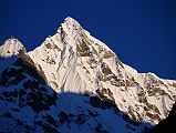 Rolwaling 05 01 Gauri Shankar South East Face From Beding I walked back out of Beding for a few minutes to catch the lower part of the south east face of Gauri Shankar at sunrise. The twin summits were hidden above that lower ridge.